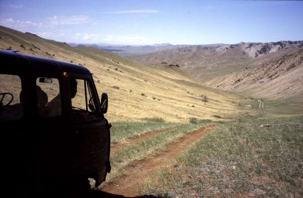 photo of Tuva, South of Kyzyl, around Erzin, UAZ jeep bus on dirt track road in the mountains behind Moren