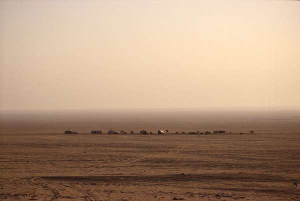 photo of South Yemen, nomadic bedouin camp in the desert between Marib and Shibam (Wadi Hadhramout)