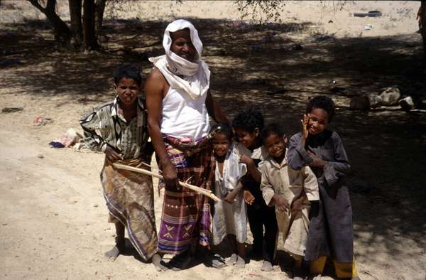 photo of Yemen, family of bedouin nomads in the desert along the way from Marib to Wadi Hadramaut (Hadramaout, Hadhramawt)
