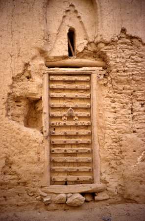 photo of Yemen, old door in mud brick house