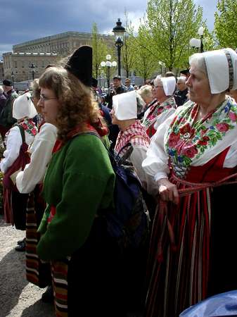 photo of Sweden, Stockholm, celebration of people from Hälsingland in traditional Swedish costume; some of them walked al the way the 500 km from Hälsingland, a traditional farming region in Central Sweden