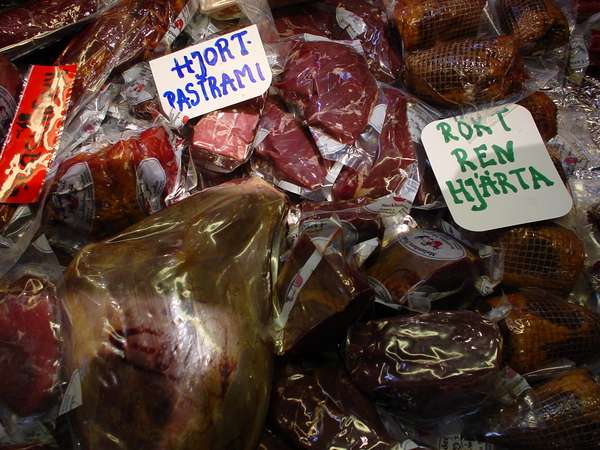 photo of Sweden, Stockholm, Östermalm market hall, selling 'hjort pastrami' (deer pastrami) and 'rökt ren hjärta' (smoked raindeer heart)