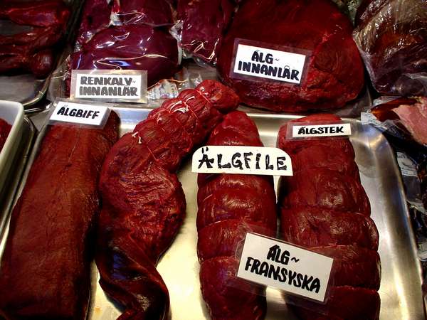 photo of Sweden, Stockholm, Östermalm market hall, selling 'renkalv innanlar' (raindeer calf innerthigh) and 'älg innanlar' (elk innerthigh) 'älgbiff' (elk beef), 'älgfile' (elk filet), 'älgstek' (elk steak)