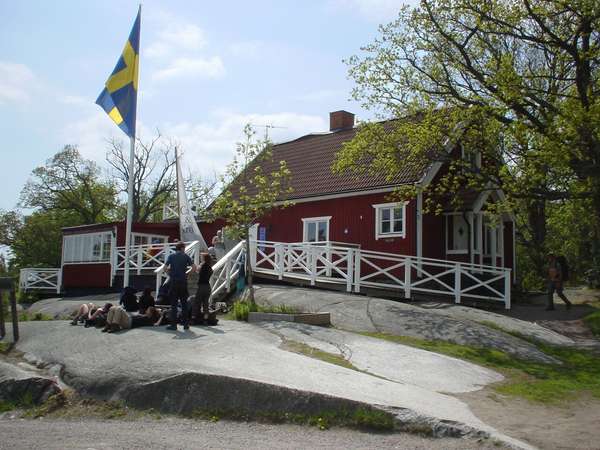 photo of Sweden, around Stockholm, typical Swedish red and white house on the rocky island of Finnhamn, one of the 24000 islands in the Stockholm Archipelago (skärg&Aring;rd)