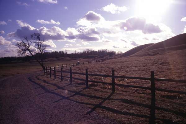 photo of Sweden, Old Uppsala, the hills are burial mounds from the time of the Swedish Folk Kings (500 AD) in Gamla Uppsala