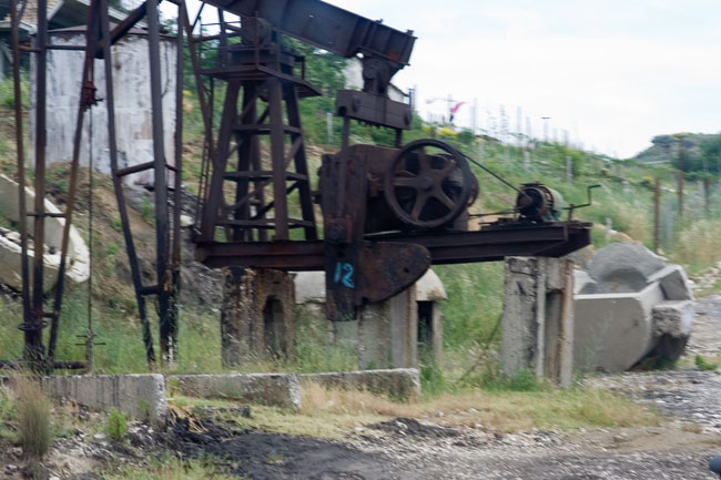 Albania photo around Fieri: Oil derrick, Petrol industry, Albanian Oil field. Albanian Ecology, environment, waste and pollution. 