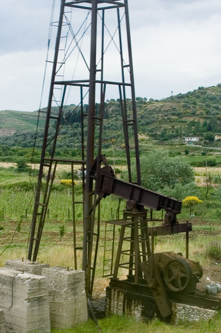 Albania photo around Fieri: Oil derrick, Petrol industry, Albanian Oil field. Albanian Ecology, environment, waste and pollution. 