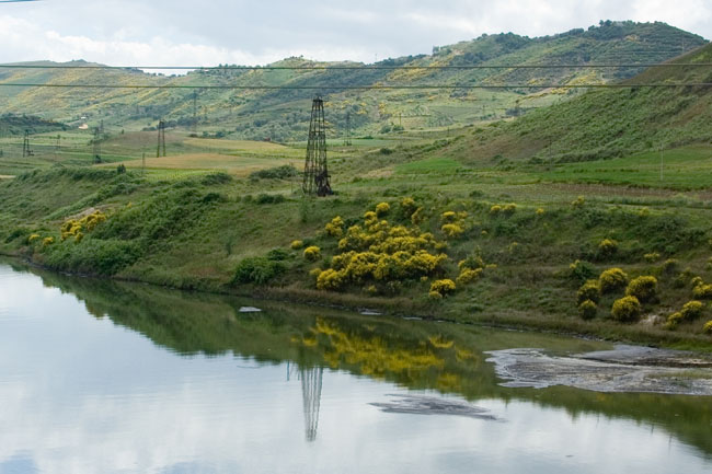 Albania photo around Fieri: Oil derrick, Petrol industry, Albanian Oil field. Albanian Ecology, environment, waste and pollution. 