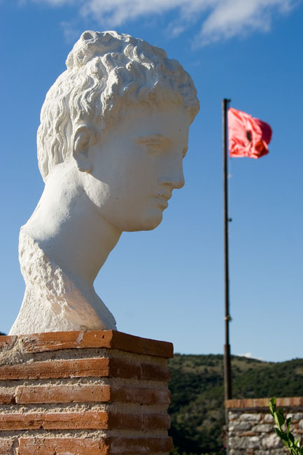 Albania photo: Butrint (Butrinti) ancient city, Statue and Albanian flag, archeology ruins World Heritage site around Saranda. 