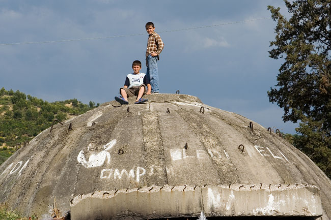 Albania photo Tirana main cemetery : Communist era defensive Albanian bunker. Concrete dome shelter built during Enver Hoxha's rule all over Albania as protection against a foreign invasion. Varreza e Sharrës cemetery. 