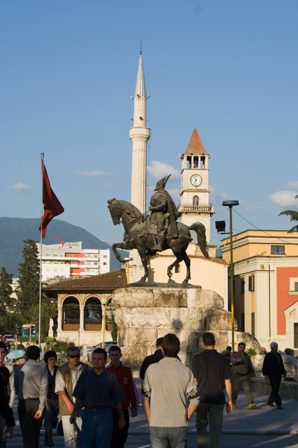 Albania photo of Tirana: Equestrial statue of Skanderbeg on his horse. Ethem Bey mosque on Sheshi Skënderbej (Skanderbeg square) and clock tower (Kulla e Sahatit) in central Tirana city. 